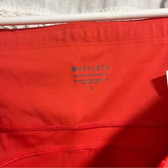 Athleta x Peloton Velocity 7/8 Orange Leggings with Zipper Pouch - Picture 8 of 11
